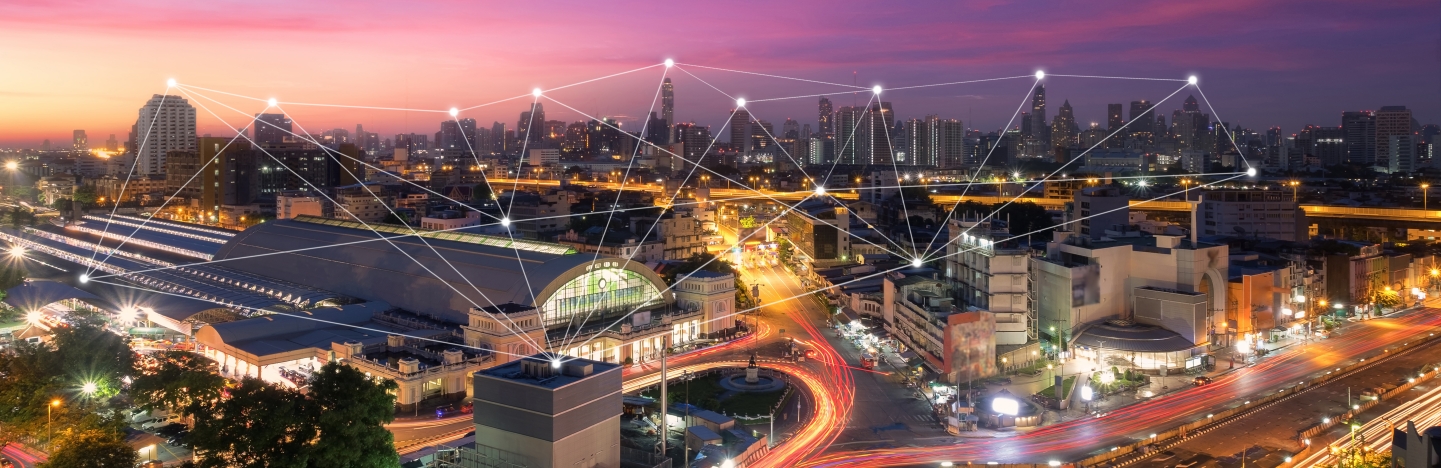 View of city with points of connected lights