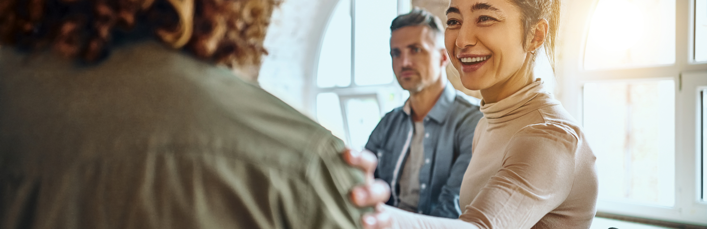 image of people offering support to one another