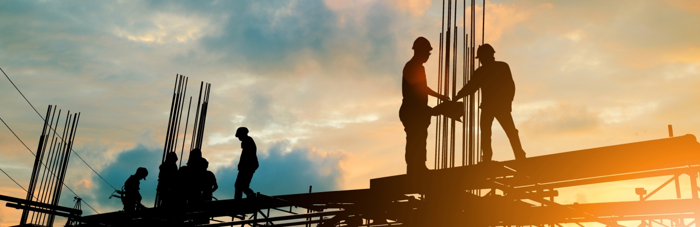 Silhouette of engineer and construction team working at site