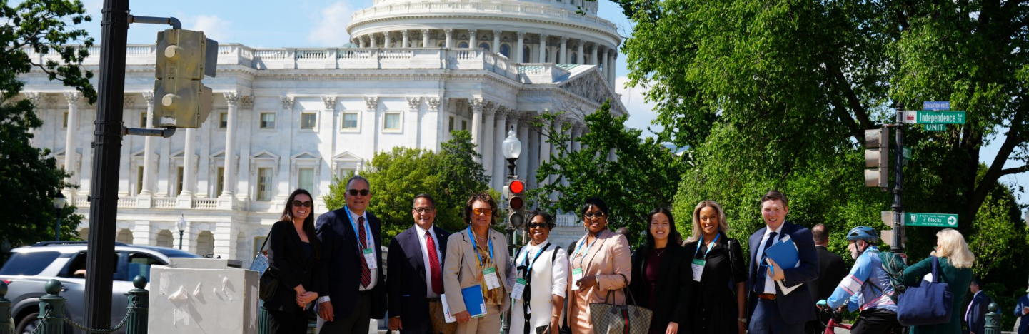 LUCC members pause for a photo near the U.S. Capitol while visiting Washington, D.C. for meetings on housing. Photo by Rich Wills