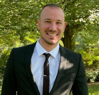 Image of f-58-55-14752220_NnmS6q5H_Tyler_Molinaro_Headshot.jpeg