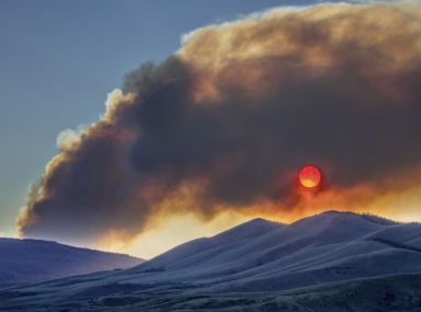 Sunset obscured by wildfire smoke