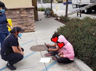 Two Monterey County, Calif. students use Wi-Fi from a Taco Bell restaurant in East Salinas to do their schoolwork in August 2020. Photo courtesy of Monterey County