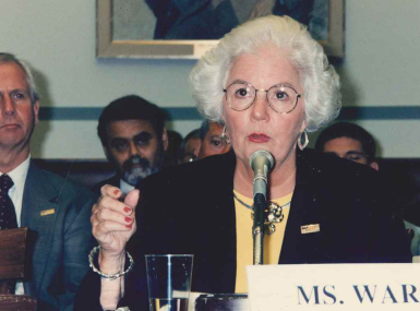 Then-NACo President Betty Lou Ward testifies in 1998. To her left are then-NACo Executive Director Larry Naake and then-Legislative Director Ed Rosado. Photo by David Hathcox