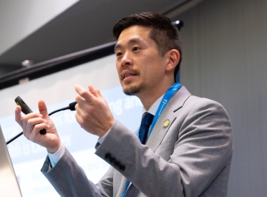 Richard Cho, U.S. Department of Housing and Urban Development, senior advisor for housing and services, speaks Saturday to members of the Health Policy Steering Committee at the NACo Legislative Conference. Photo by Leon Lawrence III