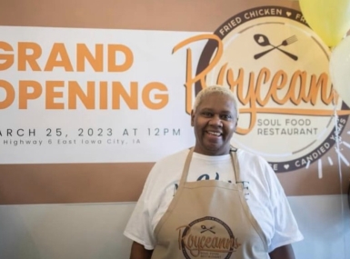 Johnson County, Iowa Supervisor Royceann Porter poses at the grand opening of her soul food restaurant, Royceann's. Photo courtesy of Royceann Porter