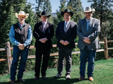 The 2024-2025 Western Interstate Region Executive Committee: Second Vice President Dwayne McFall, a Fremont County, Colo. commissioner; First Vice President John Peters, a Mono County, Calif. supervisor; President Wes McCart, a Stevens County, Wash. commissioner and Immediate Past President John Espy, a Carbon County, Wyo, commissioner. Photo by Amber Edwards