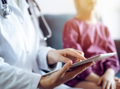 Doctor on tablet