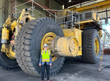 A big job: Lewis County, Wash. Commissioner Sean Swope shows off a utility vehicle at his county’s TransAlta power plant that is being converted to run on electirc and hydrogen power.
