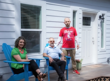 Gabrielle, Todd and Jacob Kuchta pause for a photo on the front porch of Jacob's new home, made possible by Napa County's Affordable ADU forgivable loan program. Photo by Villa/Nicholas Miller