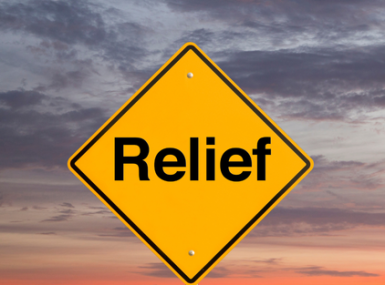 Yellow Hazard sign that says relief