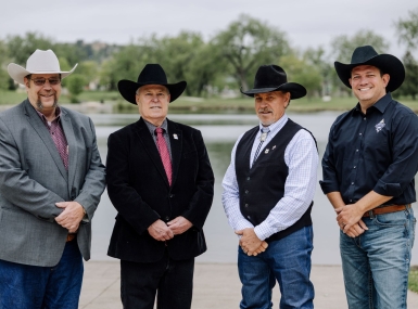 The Western Interstate Region Executive Committee meets for the first time in 2025 during the WIR Conference in Pennington County, S.D.. From left: Immediate Past President John Espy, Carbon County, Wyo.; President John Peters, Mono County, Calif.; Dwayne McFall, Fremont County, Colo. and Second Vice President Derrick DeGroot, Klamath County, Ore. Photo by Rebecca DeWitt