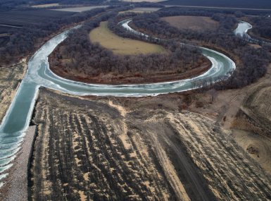 A diversion outlet returns floodwaters to the Red River in northern Cass County, N.D. A diversion channel carries floodwater west of Fargo and other Cass County areas. Photo courtesy of the Army Corps of Engineers