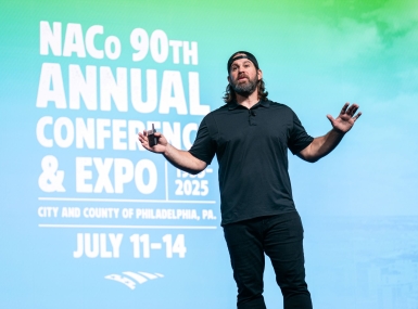 Former NFL player and magician Jon Dorenbos, mesmerizes the General Session crowd Sunday, July 13 with his magic and life story. Photo by Denny Henry