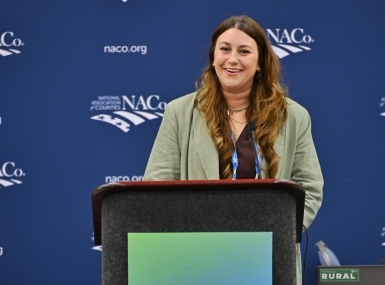 Molly Pyle, from the Center on Rural Innovation, describes her organization’s pillars for entrepreneurship success to the Rural Action Cacus July 12. Photo by Salvador Farfan