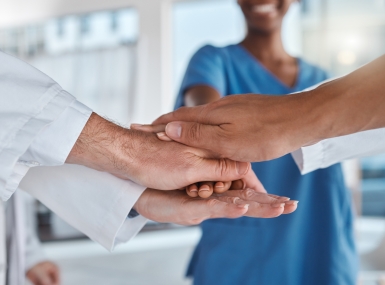 Medical motivation, doctor success and hands of team of hospital workers stacked for healthcare