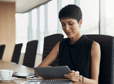 Woman reading on a laptop