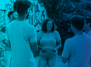 Volunteer interacting with community members