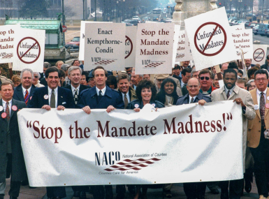 The 1990s brought a new opponent into view for counties: Unfunded mandates. President George H.W. Bush decried them during his 1992 State of the Union address. Photo by David Hathcox