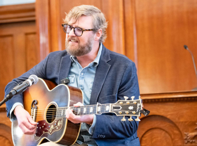 Texas-based songwriter Drew Kennedy sings for the attendees at the County Storytellers Symposium. Photos by Joe and Lisa Duty