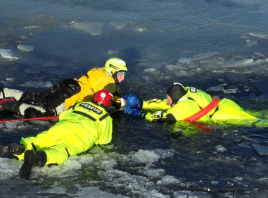 Members of the Delta County, Mich. Ice Rescue Task Force participate in a training exercise.