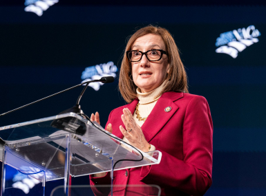 U.S. Rep. Andrea Salinas (D-Ore.), a co-chair of the Congressional Bipartisan Mental Health Caucus, discusses legislation Feb. 23 at the General Session that could help alleviate unmet mental health needs often shouldered by counties. Photo by Denny Henry