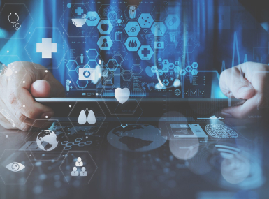 A worker holds an ipad