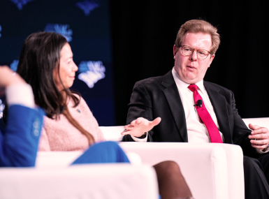 White House advisor Peter Lake explains a multi-state agreement with an electricity market that aims to limit rate increases for the next five years. Photo by Denny Henry
