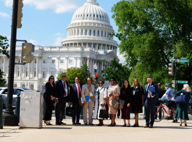LUCC members pause for a photo near the U.S. Capitol while visiting Washington, D.C. for meetings on housing. Photo by Rich Wills