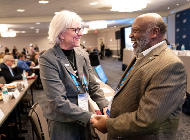 Former NACo President Mary Ann Borgeson greets Beaufort County, N.C. Commissioner Ed Booth during the 2026 Legislative Conference Board of Directors meeting. Photo by Denny Henry