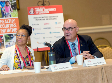 Athens County, Ohio Commissioner Lenny Eliason and Ramsey County, Minn. Commissioner Toni Carter prepare for the Healthy Counties Innovation Council meeting during the 2019 Annual Conference in Davidson County, Tenn. Photo by Jessica Yurinko