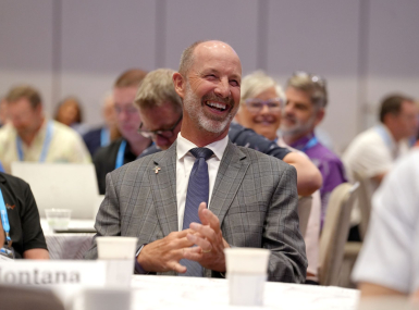 Ravalli County, Mont. Commissioner Greg Chilcott reacts to a testimonial by Klamath County, Ore. Commissioner Derrick DeGroot during Chilcott’s final WIR Conference. Photo by Charlie Ban