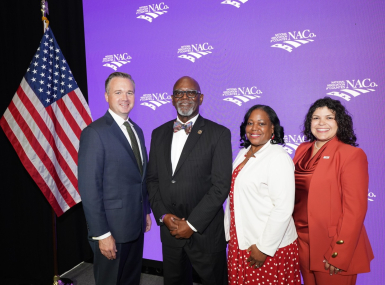 NACo's 2026-2027 officers gather following the 2026 Annual Business Meeting during the Annual Conference in Orleans Parish, La. From left: Immediate Past President J.D. Clark, President George Dunlap, First Vice President Alisha Bell and Second Vice President Sarah Benatar. Photo by Denny Henry