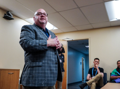 Director of Real-Time Crime Center Ross Bourgeois speaks to NACo members Thursday about the City of New Orleans monitoring system. Photo by Leon Lawrence III