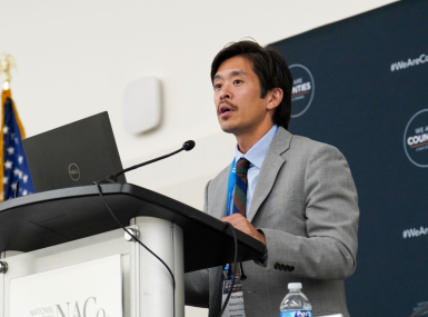 Manatt Health Managing Director Richard Cho outlines opportunities for housing development while addressing the Large Urban County Caucus. Photo by Leon Lawrence III