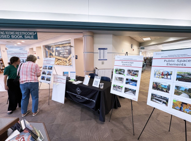 Residents peruse information at a recent community engagement event for the Centreville Co-Location Project at the Centreville Regional Library in Fairfax County, Va. Photo courtesy of Fairfax County