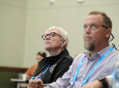 Hemphill County, Texas Judge Lisa Johnson (left) and Cochran County, Texas Judge Pat Henry listen to a discussion about philanthropic organizations managing community benefit agreements. Photo by Charlie Ban