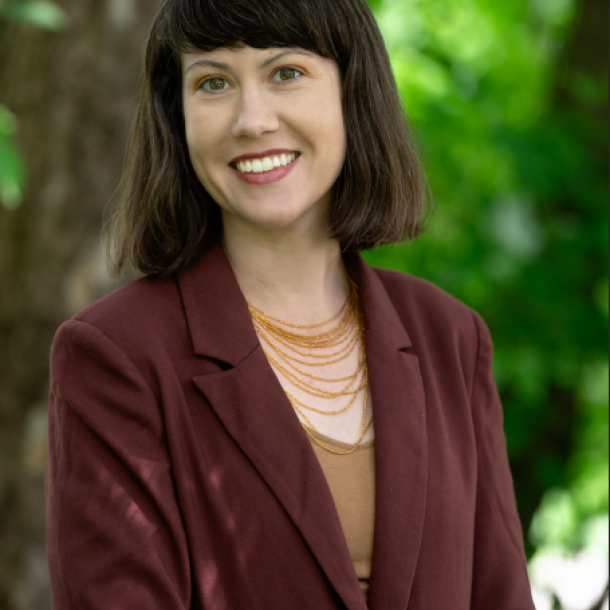Woman with brown hair, smiling