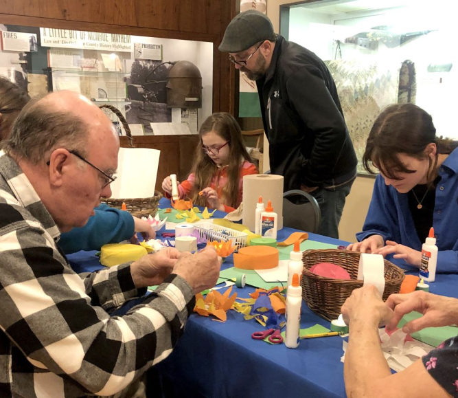 YesterWays participants knits mittens and wristlets at the Monroe County, Mich. Museum. Photo courtesy of JJ Przeowzniak