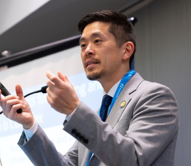 Richard Cho, U.S. Department of Housing and Urban Development, senior advisor for housing and services, speaks Saturday to members of the Health Policy Steering Committee at the NACo Legislative Conference. Photo by Leon Lawrence III