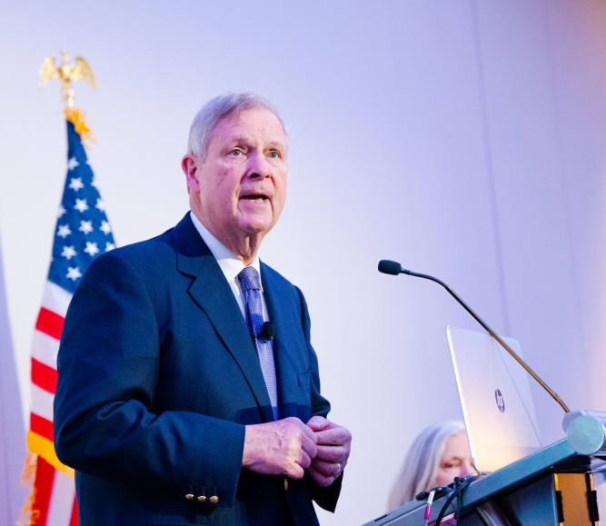 U.S. Department of Agriculture Secretary Tom Vilsack describes the benefits of climate-smart agriculture to NACo’s Rural Action Caucus Feb. 11. Photo by Leon Lawrence III