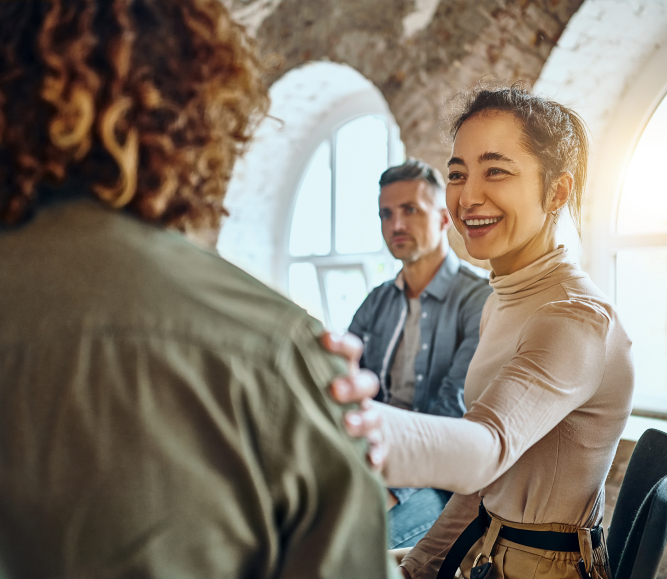 image of people offering support to one another