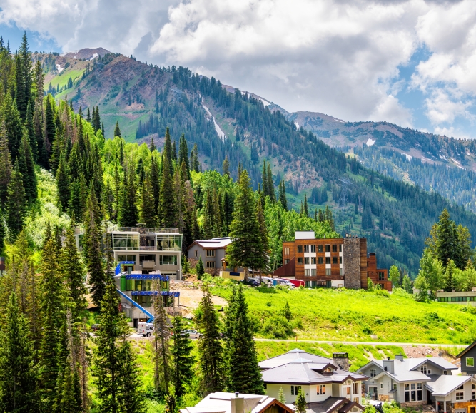 Alta at Albion Basin, Utah cityscape small ski resort town village in summer near Little Cottonwood Canyon by hotel lodge and houses