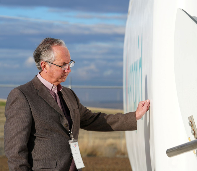 Carson County, Texas Judge Dan Looten gets hands-on with a wind turbine at the Avangrid National Training Center — his first time touching one, despite more than 700 turbines in the county. Photo by Charlie Ban