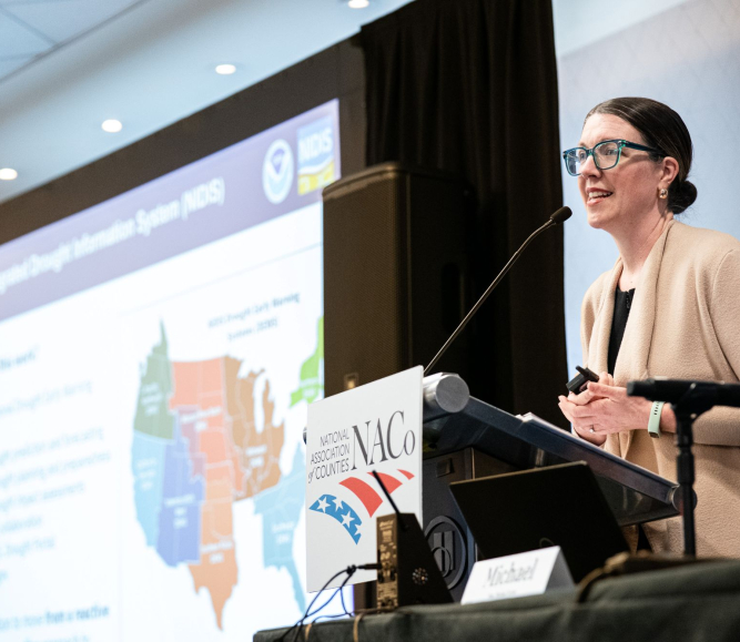 NOAA’s Elizabeth Ossowski discusses the National Integrated Drought Information System Feb. 21 with members of the NACo Environment, Energy and Land Use Policy Steering Committee. Photo by Denny Henry