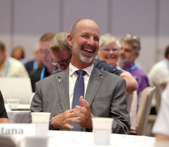 Ravalli County, Mont. Commissioner Greg Chilcott reacts to a testimonial by Klamath County, Ore. Commissioner Derrick DeGroot during Chilcott’s final WIR Conference. Photo by Charlie Ban