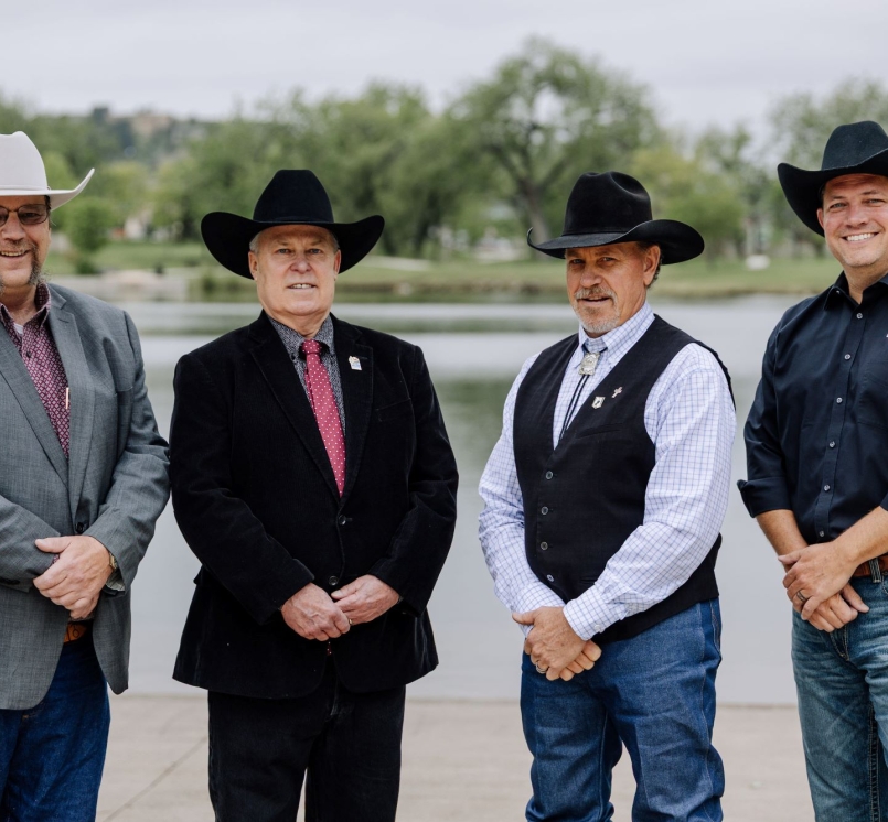 The Western Interstate Region Executive Committee meets for the first time in 2025 during the WIR Conference in Pennington County, S.D.. From left: Immediate Past President John Espy, Carbon County, Wyo.; President John Peters, Mono County, Calif.; Dwayne McFall, Fremont County, Colo. and Second Vice President Derrick DeGroot, Klamath County, Ore. Photo by Rebecca DeWitt