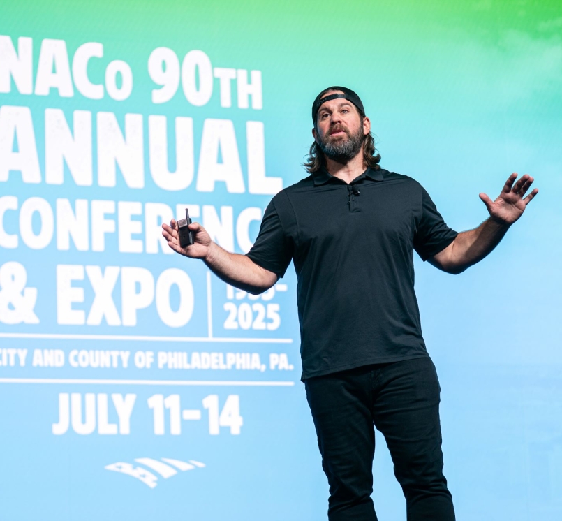 Former NFL player and magician Jon Dorenbos, mesmerizes the  General Session crowd Sunday, July 13 with his magic and life story. Photo by Denny Henry