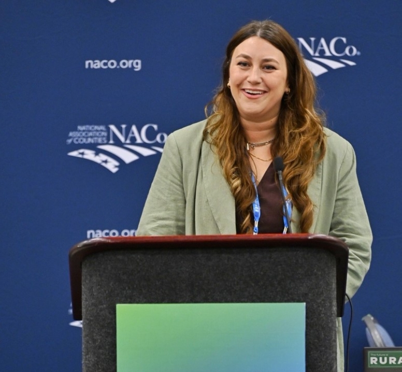 Molly Pyle, from the Center on Rural Innovation, describes her organization’s pillars for entrepreneurship success to the Rural Action Cacus July 12. Photo by Salvador Farfan