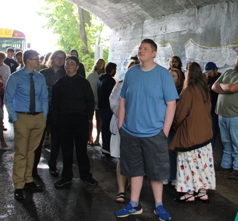 A Vermillion North High School senior admires the murals on in the tunnel close to campus. Photo by RJ Dunavan